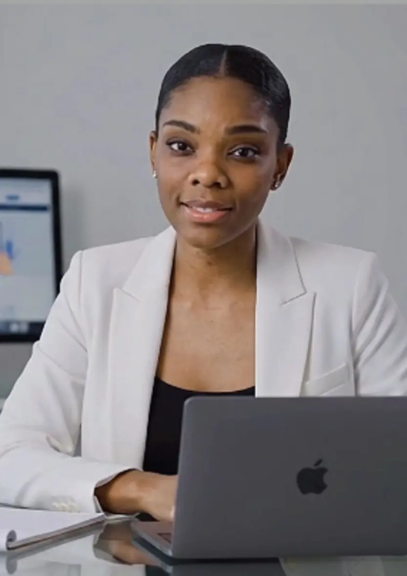 Helena Pedro speaking while seated behind a laptop